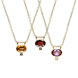 14k Yellow Gold 7x5 Gemstone and Diamond accent Pendant